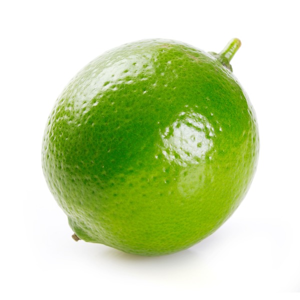 Photo of organic limes on a kitchen counter