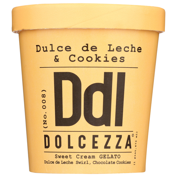 A photo of Dolcezza Gelato containers on a wooden table