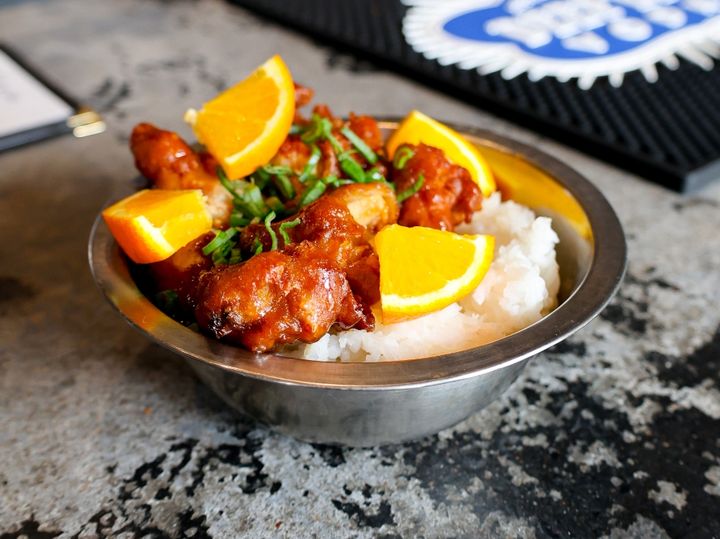 A plate of orange chicken from Tigers Den