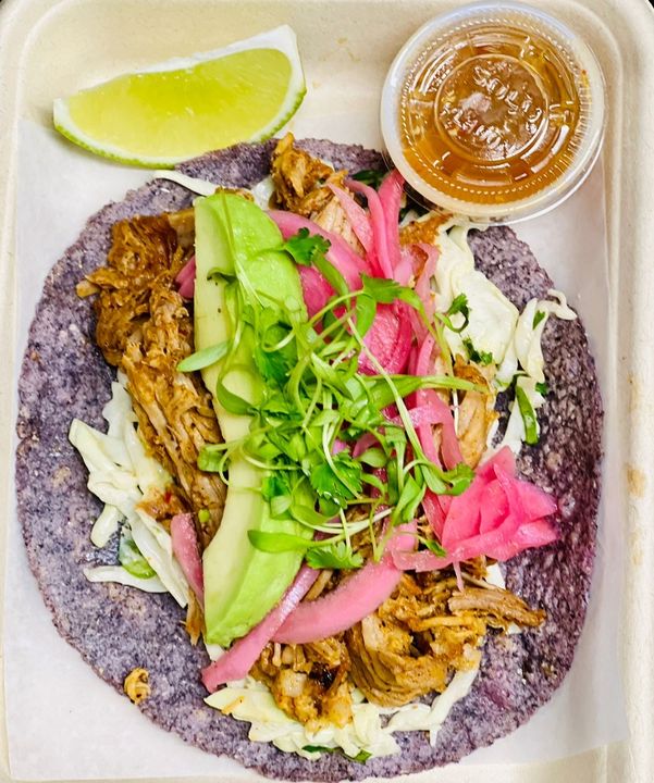 Photo of a carnitas taco on a plate