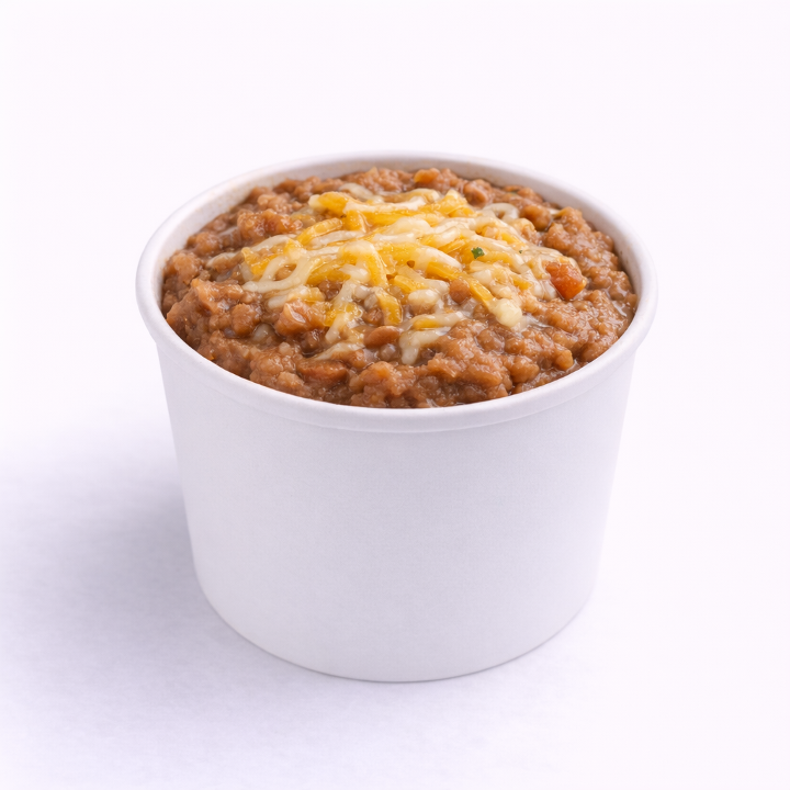 A bowl of creamy refried beans