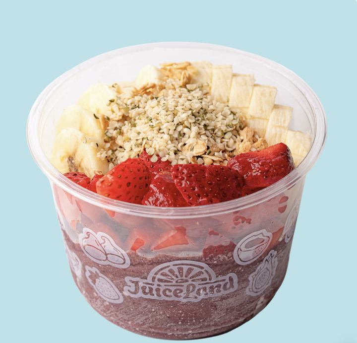 A photo of a frozen acai bowl with granola and fruit